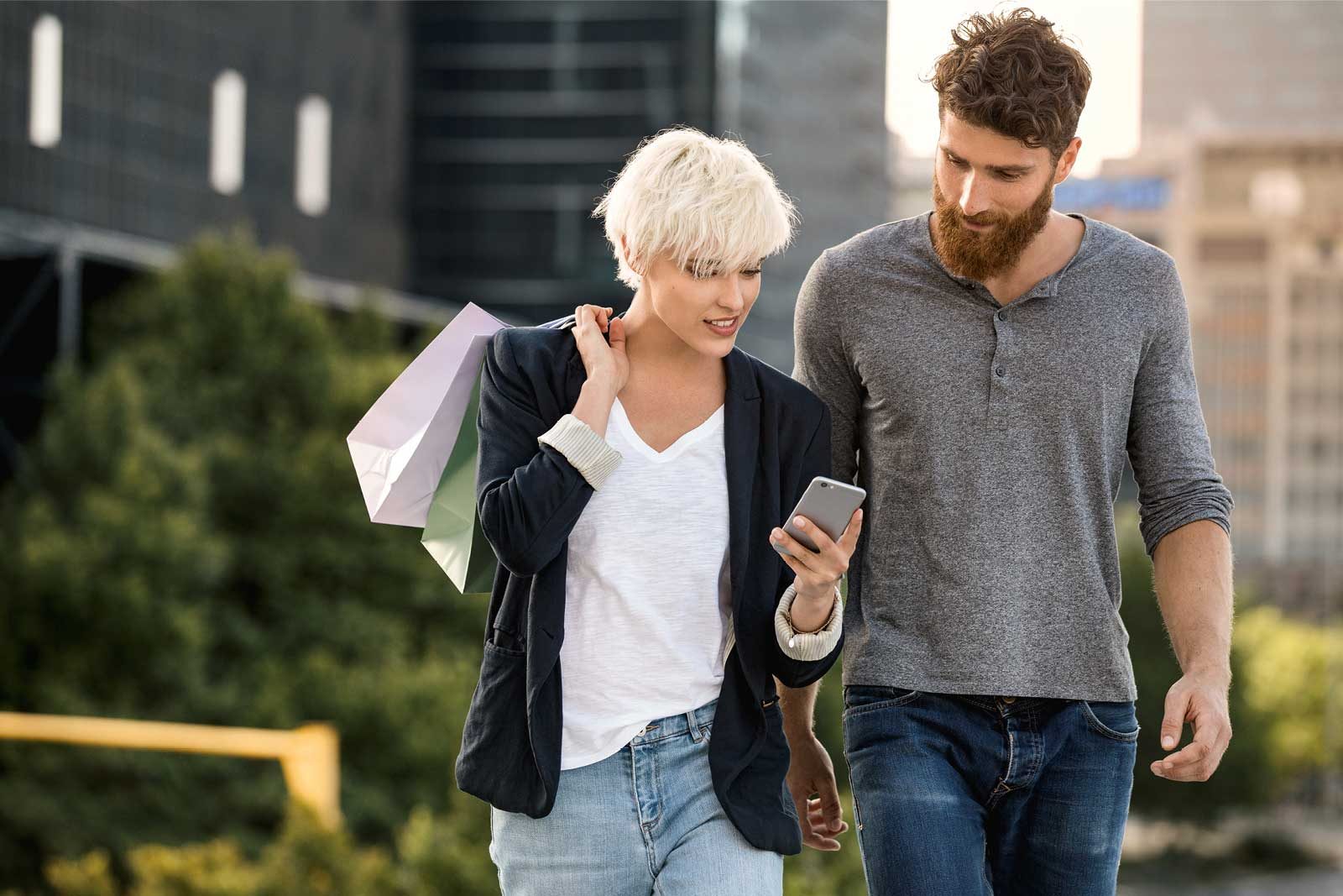 young-couple-man-woman-walking--street-phone-teaser.jpg